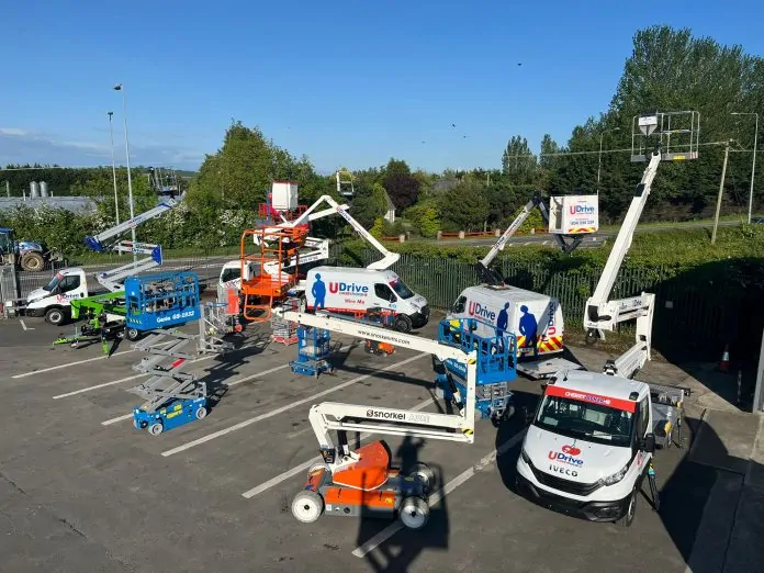 various cherry pickers in the air to show reach - sunny day in 2024 ireland